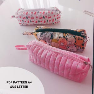 Handmade quilted glasses case with flap, beginner sewing project. Soft padded fabric eyeglass pouch with lining, quilted texture, and secure flap closure. PDF sewing pattern sample shown, protective sunglasses case, cute fabric craft gift idea.