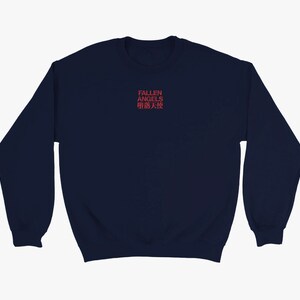 May include: A navy blue sweatshirt with the text "FALLEN ANGELS 堕天使" in red.