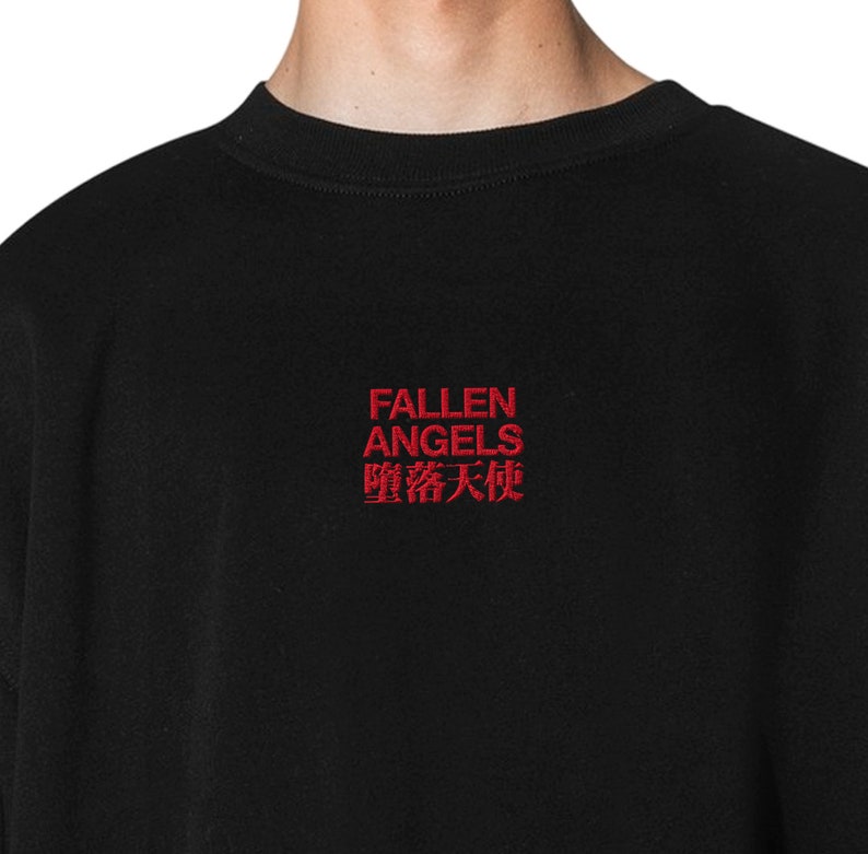 May include: Black long-sleeve shirt with red embroidered text that reads "FALLEN ANGELS 堕落天使".