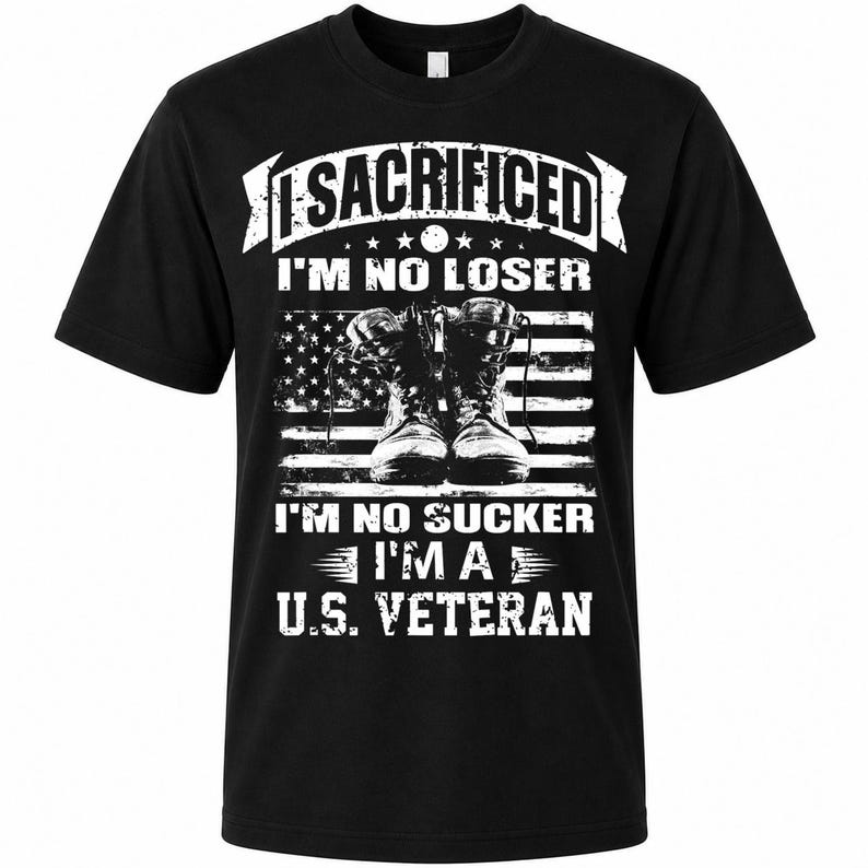 May include: Black t-shirt with a white graphic featuring combat boots in front of an American flag. The text reads "I SACRIFICED I'M NO LOSER I'M NO SUCKER I'M A U.S. VETERAN."