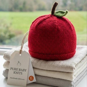 Handmade Merino Wool Red Apple Hat: Knitted Baby Beanie with Crochet Leaf