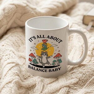 Mug Balancing Cat on Unicycle with Text It's All About Balance Baby image 3