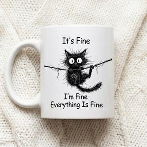 It's Fine I'm Fine Cat Doodled Mug Clinging to Thread Black Ink image 1
