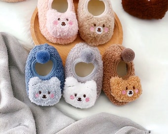 Baby slipper. Furry animal slipper. Cot shoe