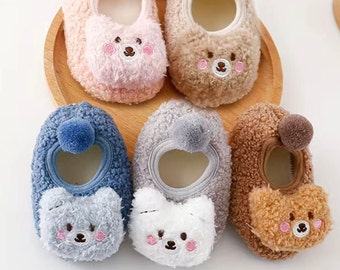 Baby slipper. Furry animal slipper. Cot shoe