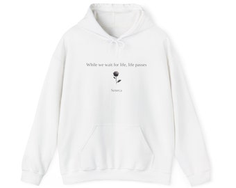 Stoic Quote Seneca Unisex Heavy Blend™ Hoodie, "While we wait for life..."