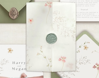 May include: A wedding invitation with a floral design and a pink ribbon. The invitation reads "Harry and Megan" and includes the date "Friday 24th".
