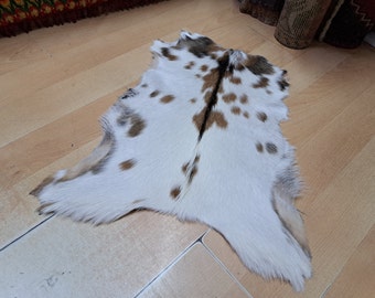 Vintage Goat Fur Rug: Scandinavian Style Hide Pelt, 1.3 x 2.2 ft
