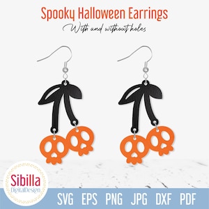 Könnte beinhalten: Ein Paar schwarze und orangefarbene Halloween-Ohrringe in Form von Kirschen mit Totenkopfdetails. Die Ohrringe sind mit oder ohne Löcher erhältlich.