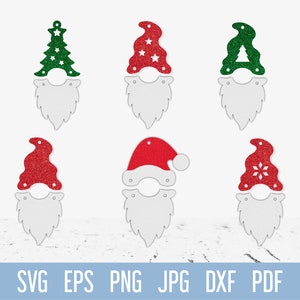 May include: Six different Christmas gnome SVG cut files. Each gnome has a different hat, including a red Santa hat, a green Christmas tree hat, and a red hat with a snowflake. The gnomes are all white with a beard.