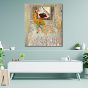 May include: A square wall art print featuring an impressionist painting of a washstand with a mirror, a basin, and a vase of orange flowers. The scene is rendered in soft, muted tones of beige, white, and light blue, capturing a domestic interior.