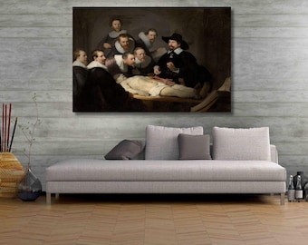 May include: A rectangular wall art print featuring Rembrandt's The Anatomy Lesson of Dr. Nicolaes Tulp, depicting a group of men in dark clothing and white collars gathered around a reclining figure, displayed above a light gray sofa.