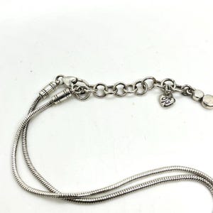 Collier tourbillon BRIGHTON vintage ton argent avec pendentif disque chaîne serpent signé image 10