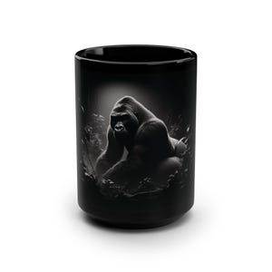May include: Black ceramic mug with a graphic of a gorilla in a dark forest setting.