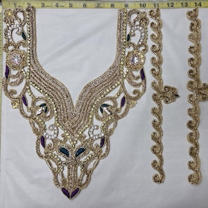 May include: A gold embroidered neckline applique with two matching vertical trim strips, featuring purple and teal accents, clear rhinestones, and metallic thread. A yellow measuring tape shows the neckline is 13 inches wide and 13 inches long.