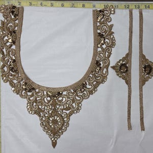 May include: A gold-toned embroidered neckline applique with intricate floral patterns, metallic thread, and sequins. A yellow measuring tape shows the main piece is approximately 10 inches wide and 13 inches long, with two additional matching strips.
