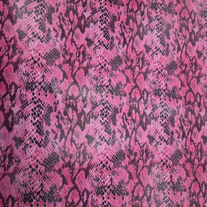 May include: A textured material featuring a repeating snakeskin pattern in vibrant shades of hot pink and black. The surface displays a detailed, scale-like graphic print that covers the entire area with a consistent, high-contrast color scheme.