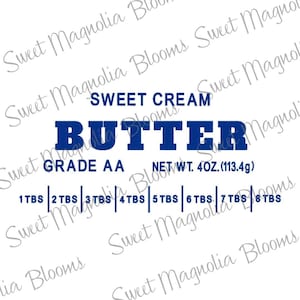 May include: A blue and white label with the text "Sweet Cream Butter" in bold blue letters. The label also includes the text "Grade AA" and "Net Wt. 4 oz. (113.4g)". The label has a measurement guide for tablespoons, from 1 to 8.