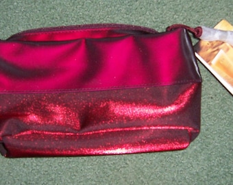 YSL Opium Makeup Bag: Iridescent Red Shimmer Cosmetic Pouch with Tassel