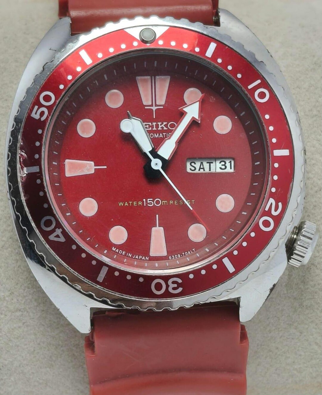 Refurbished Seiko Turtle Automatic Wrist Watch: Red Dial Day/date