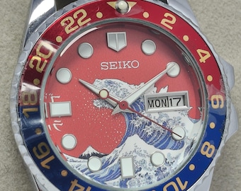 Odnowiony automatyczny zegarek na rękę Seiko Wave Godzilla: czerwona tarcza, dzień i data, wyprodukowano w Japonii