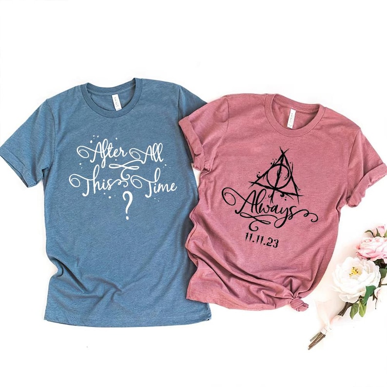 May include: Two t-shirts, one blue and one pink, with Harry Potter themed text and graphics. The blue shirt says "After All This Time?" and the pink shirt says "Always" with the Deathly Hallows symbol and the date 11.11.23.