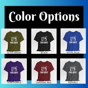 May include: Six t-shirts in different colors, each featuring a white graphic of a toolbox with the text "FIXOLOGIST" on it. The colors are olive green, black, royal blue, team purple, cardinal red, and asphalt.