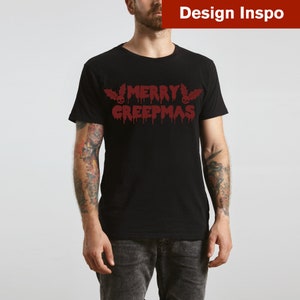 May include: A black t-shirt with a red dripping text design that says "Merry Creepmas" with a skull and holly leaf on either side of the text.