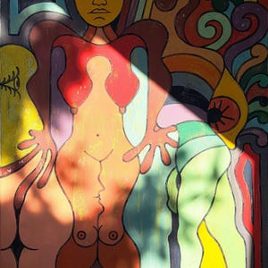 May include: A colorful painting featuring a stylized central figure with a yellow face and a red torso, surrounded by abstract shapes, swirling lines, and a prominent eye motif. The artwork uses a vibrant palette of orange, green, blue, and purple.