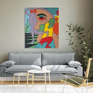 May include: Abstract painting of a face with a green, yellow, red, and blue colour scheme. The face is surrounded by other figures, including a woman in a purple dress.