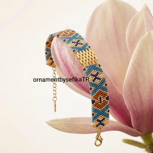 An elegant bracelet with Miyuki beads and a steel chain. Valentine's Day gift. image 1