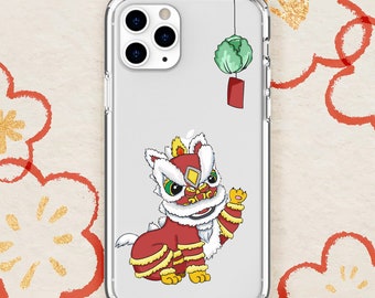 May include: A clear phone case with a red and white lion dance costume illustration and a hanging red lantern with a green cabbage on top.