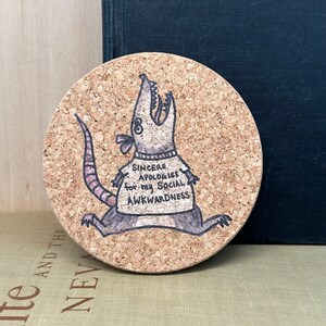 funny cork coaster with a possum saying apologies for my social awkwardness