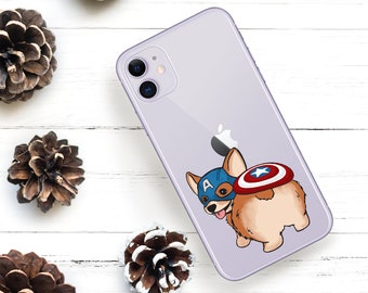 May include: A purple iPhone case with a cartoon image of a corgi wearing a Captain America costume. The corgi is holding a shield behind its back.