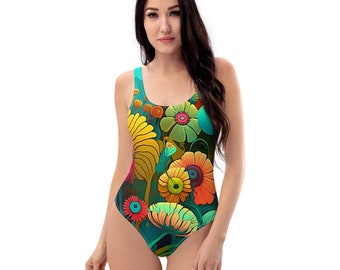 May include: A one-piece swimsuit with a colorful floral print. The swimsuit has a scoop neck and a racerback style. The print features a variety of flowers in shades of yellow, orange, red, pink, and blue.
