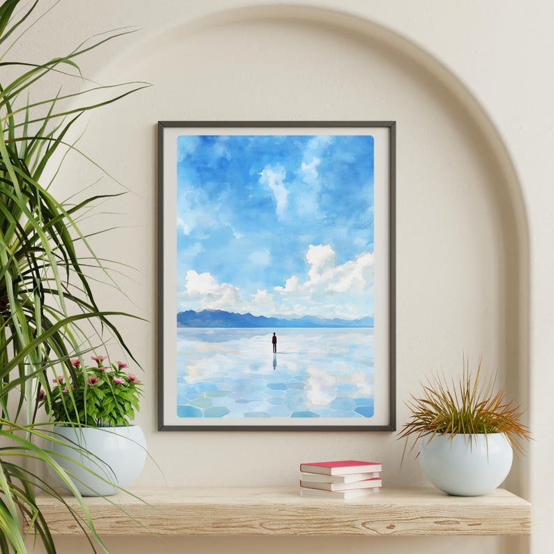 May include: A framed watercolor painting of a person standing in a body of water with a blue sky and white clouds in the background.