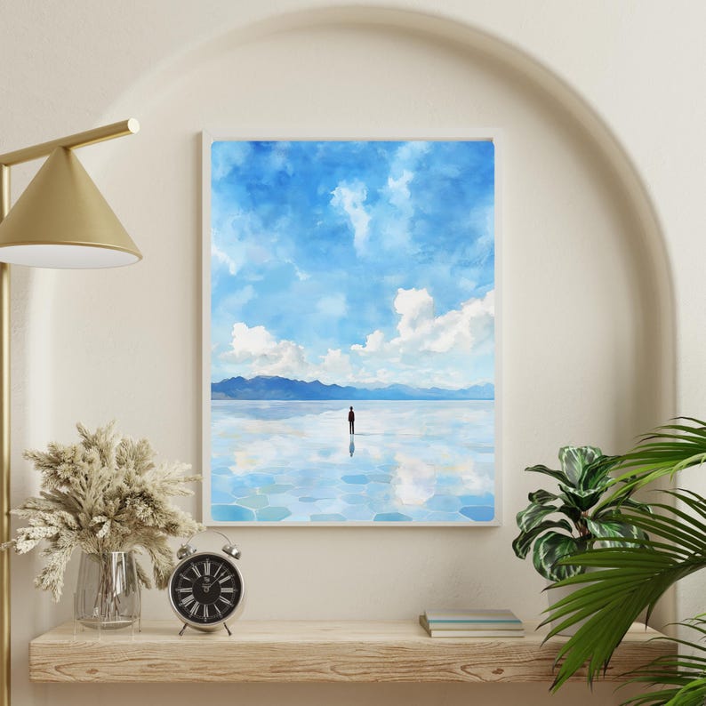 May include: A watercolor painting of a lone figure standing in a vast, reflective body of water. The sky is a bright blue with fluffy white clouds. The mountains in the distance are barely visible.