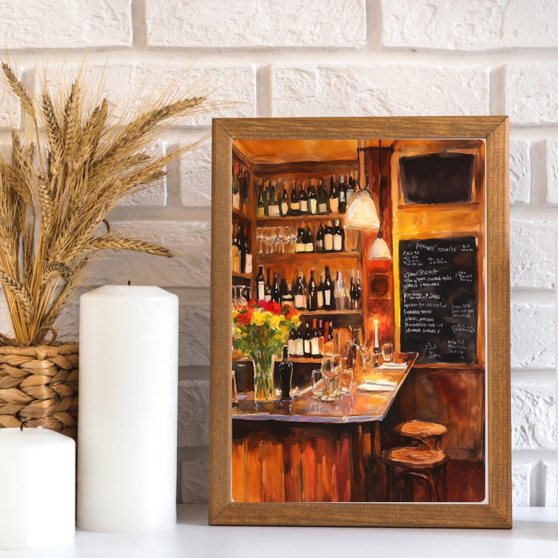 May include: A painting of a bar interior with a wooden counter, shelves stocked with wine bottles, and a chalkboard menu. The bar is lit by warm, yellow light, and there are two stools at the counter. The painting is framed in a brown wooden frame.