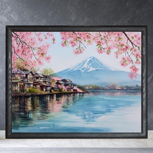 Peut inclure: Peinture &agrave; l'aquarelle d'un paysage japonais avec le Mont Fuji en arri&egrave;re-plan. Des cerisiers en fleurs roses encadrent la sc&egrave;ne, avec des maisons traditionnelles au bord du lac. L'&oelig;uvre est encadr&eacute;e dans un cadre en bois noir.