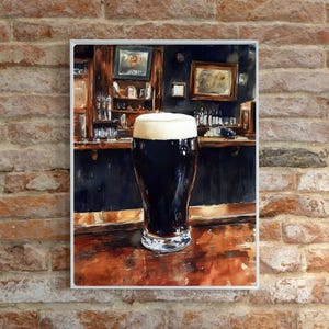 May include: A watercolor painting of a pint of dark beer with a thick, creamy head. The glass sits on a wooden bar in front of a dark wooden bar with framed pictures. The background is a brick wall.