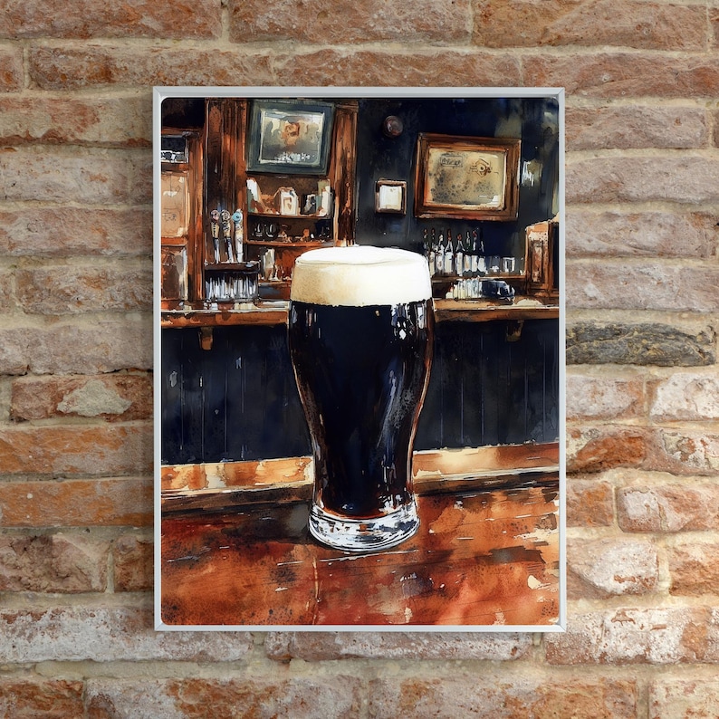 May include: A watercolor painting of a pint of dark beer with a thick, creamy head. The glass sits on a wooden bar in front of a dark wooden bar with framed pictures. The background is a brick wall.