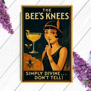 A vintage style poster with a woman in a black dress and a feather headband. She is holding her finger to her lips and looking at the viewer. The poster has a yellow and black honeycomb pattern and text that reads 'The Bee's Knees, Simply Divine... Don't Tell!'.
Bee's Knees Vintage Poster | Simply Divine Flapper Art | 1920s Gin Honey Cocktail Print | Art Deco Bar Wall Decor | Speakeasy Gift