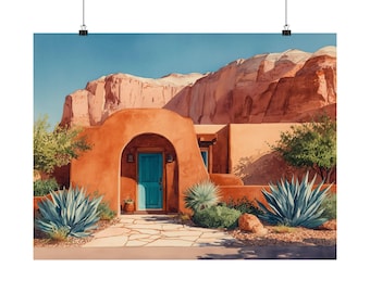 May include: Watercolor print of a Southwestern adobe home with a turquoise door and a red-orange facade. The artwork features desert plants and a mountain backdrop under a clear blue sky. The print is displayed on a white background.