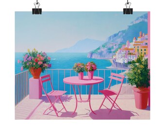 May include: A vibrant print of a seaside scene featuring a pink table and chairs on a balcony overlooking the ocean. The artwork includes colorful flowers in pots, a white railing, and a coastal town in the background. The color palette is dominated by pinks, blues, and greens.