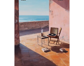 May include: An artistic print depicts a serene outdoor scene with a vintage record player on a chair, a small table with a mug, and books on a tiled patio. The background features the ocean and a clear blue sky, with warm sunlight casting shadows.