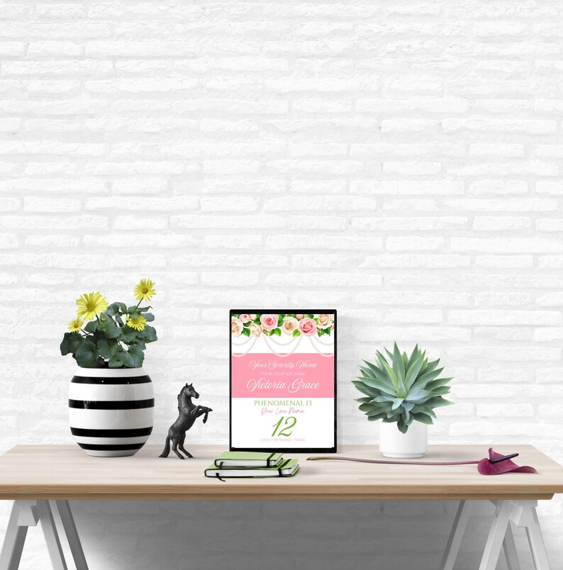 May include: A printable sign with a pink background and floral design. The text on the sign reads "Your Graduation Party" and "Gloria Grace" with the date "Phenomenal 13" and the number "12".