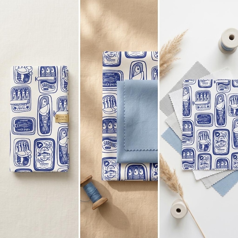 K&ouml;nnte beinhalten: Eine Sammlung von Stoffmustern und ein Notizbuch mit einem sich wiederholenden Muster aus blau-wei&szlig;en Sardinenb&uuml;chsen. Das Bild zeigt einen blauen Stoffmuster, Garnrollen und verschiedene Stoffmuster in Blau- und Graut&ouml;nen.