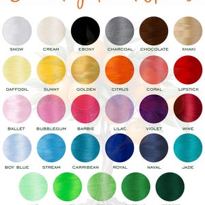 May include: A color chart of embroidery thread options, featuring a variety of colors such as Snow, Ebony, and Daffodil. The text "Embroidery Thread Options" is at the top, with the "Gracious Grove Studio" logo at the bottom.