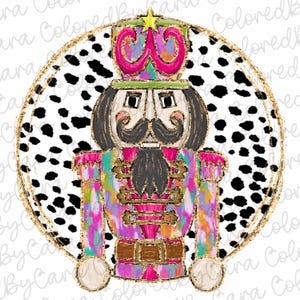May include: A colorful, whimsical nutcracker with a pink hat and a gold star on top. The nutcracker is standing in front of a black and white dalmatian print background.
