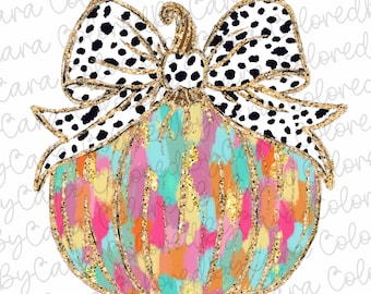 May include: A colorful pumpkin with a black and white polka dot bow. The pumpkin is painted with shades of pink, orange, yellow, blue, and green. The bow is tied around the stem of the pumpkin.